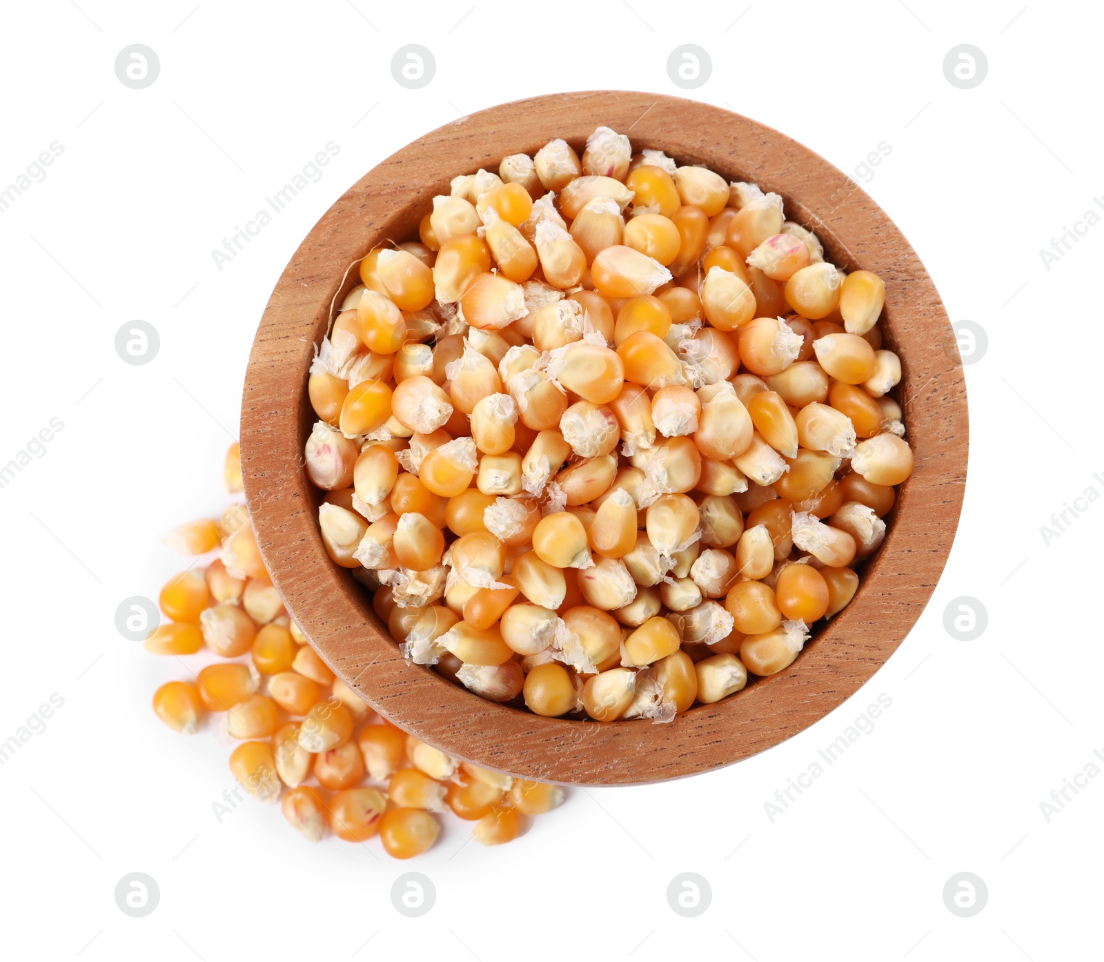 Photo of Fresh corn kernels in wooden bowl isolated on white, top view