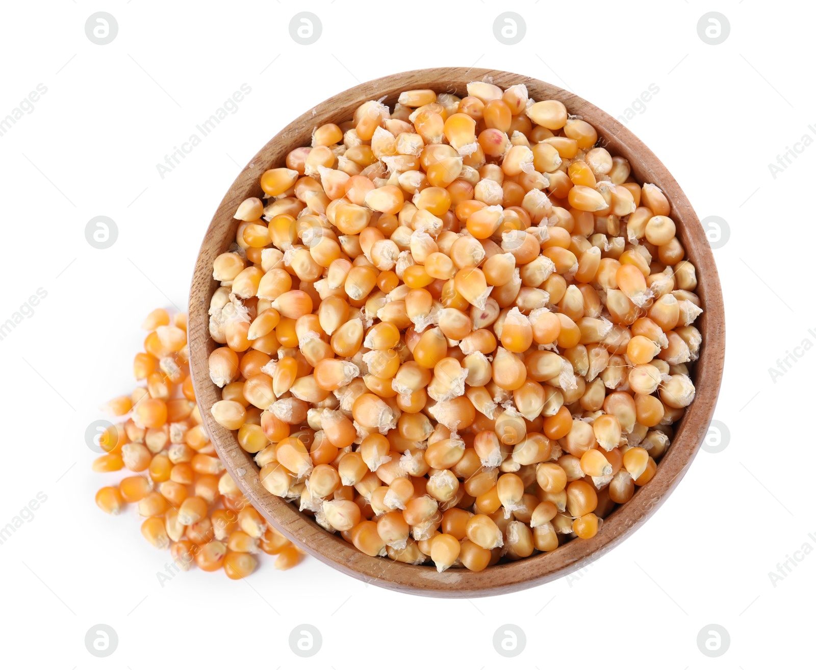 Photo of Fresh corn kernels in wooden bowl isolated on white, top view