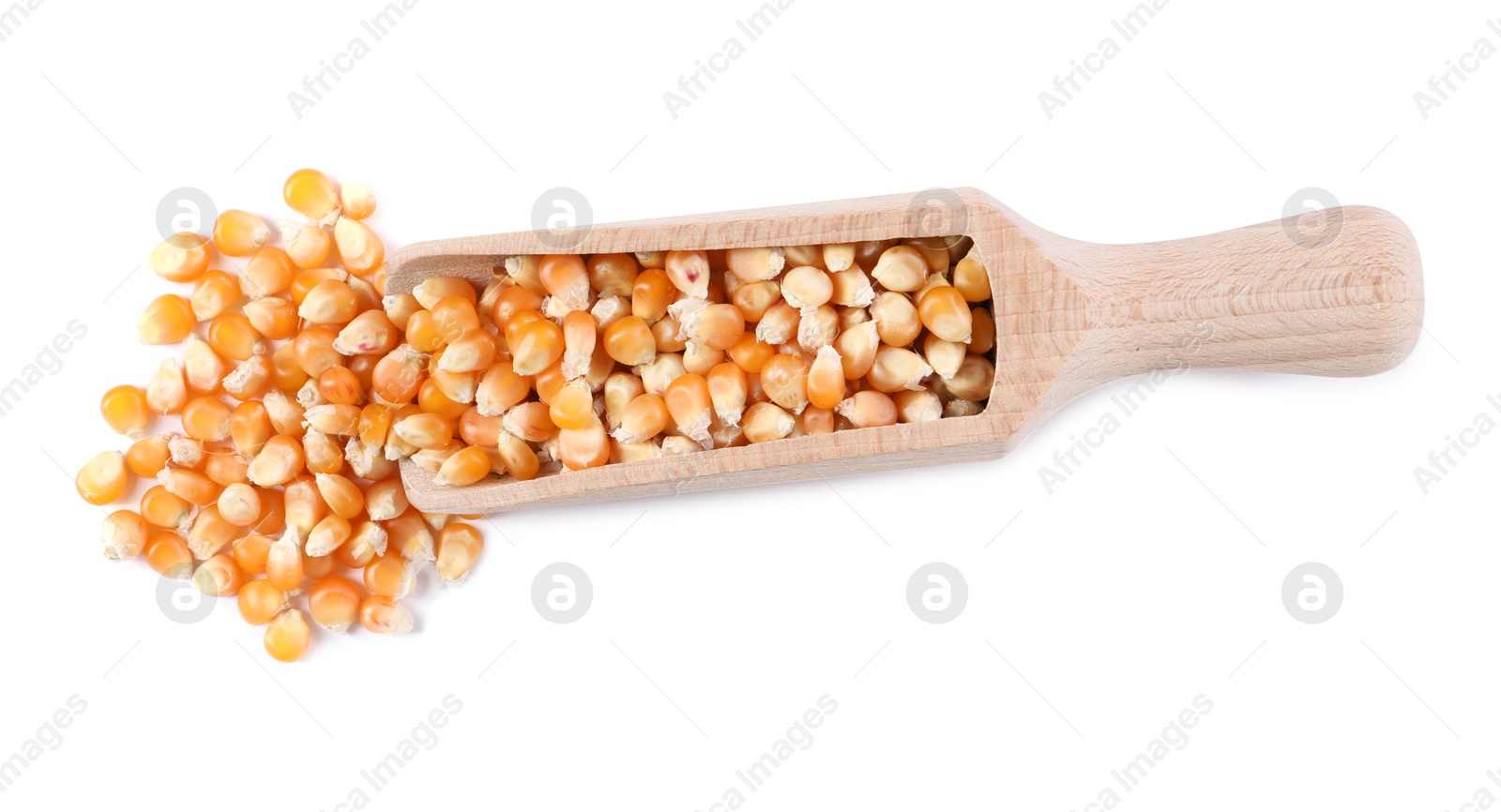 Photo of Fresh corn kernels in wooden scoop isolated on white, top view