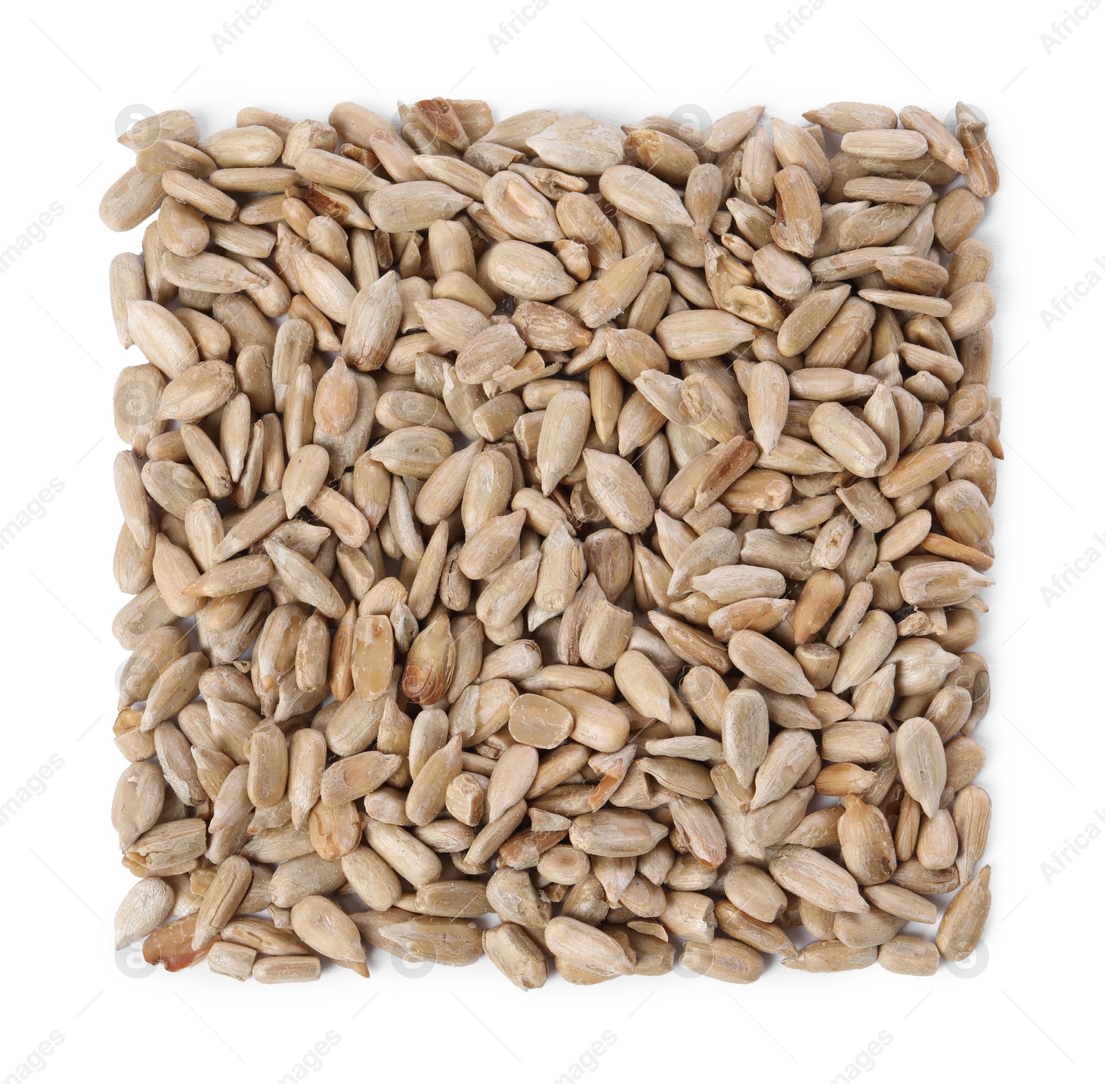 Photo of Pile of peeled sunflower seeds isolated on white, top view