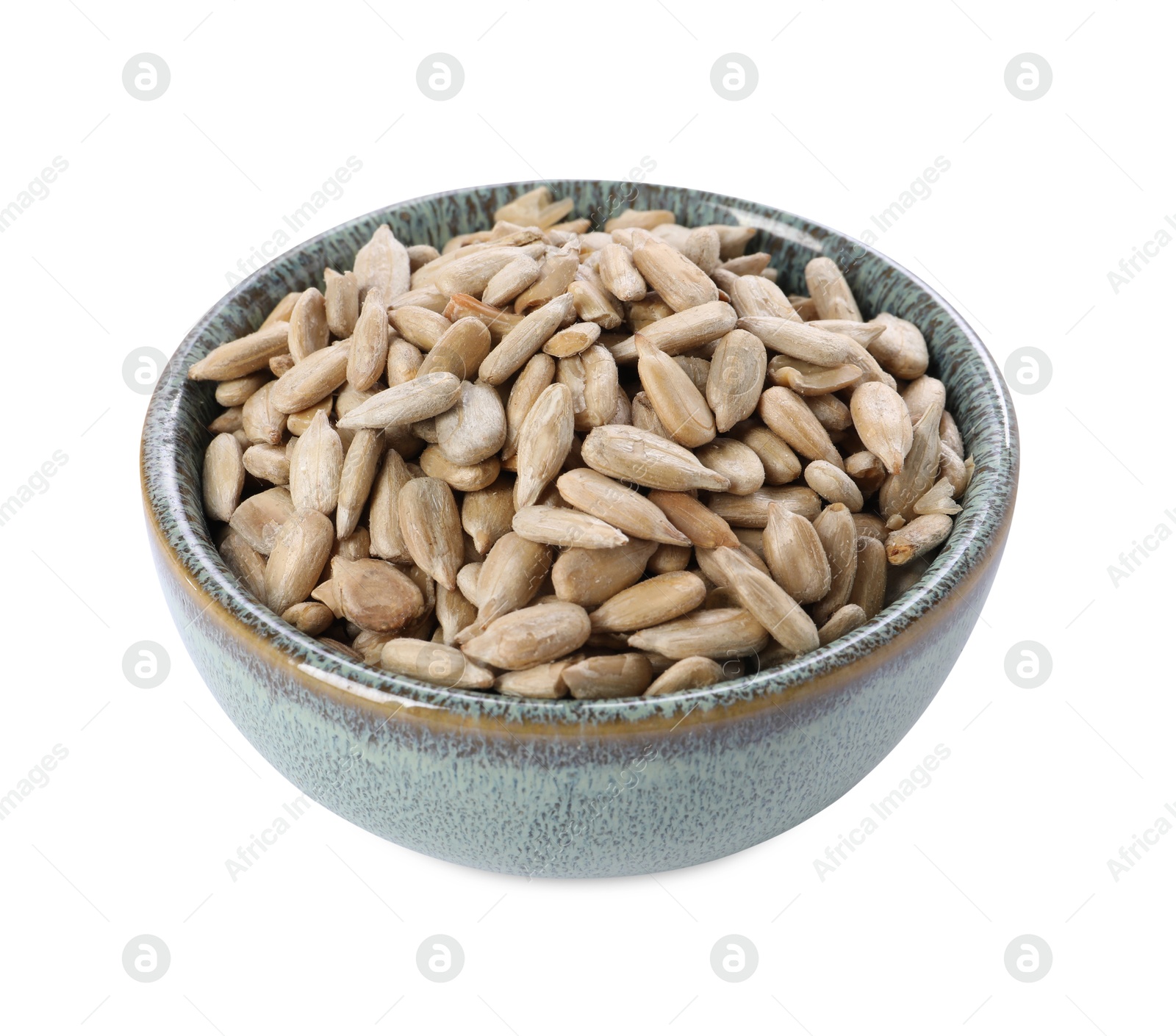 Photo of Peeled sunflower seeds in bowl isolated on white