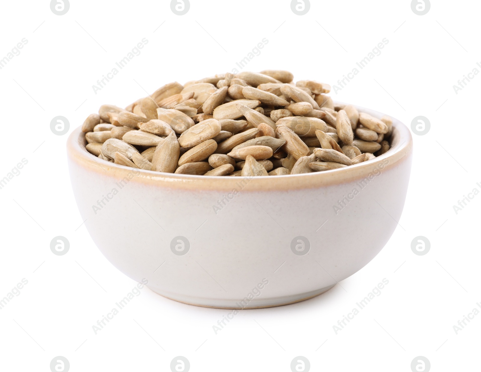 Photo of Peeled sunflower seeds in bowl isolated on white