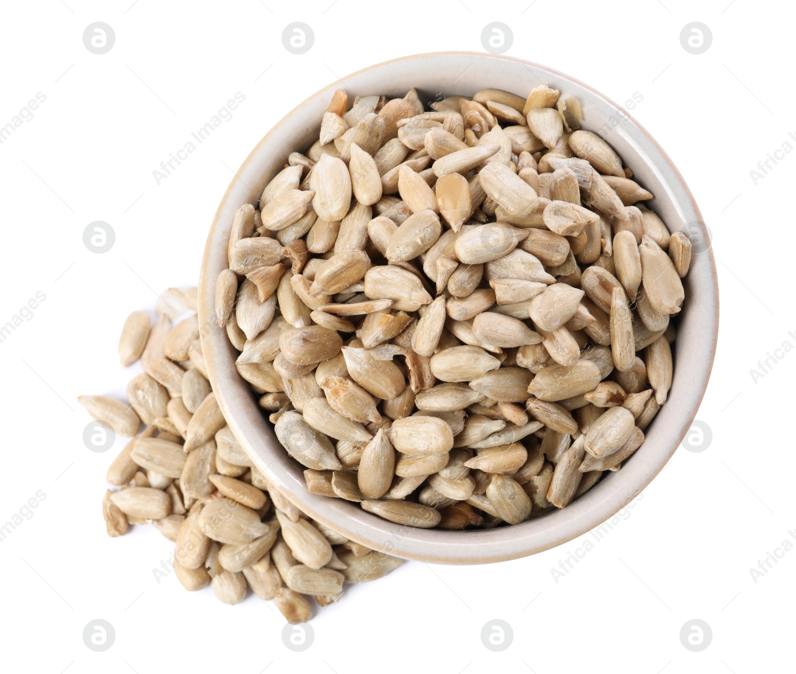 Photo of Peeled sunflower seeds in bowl isolated on white, top view