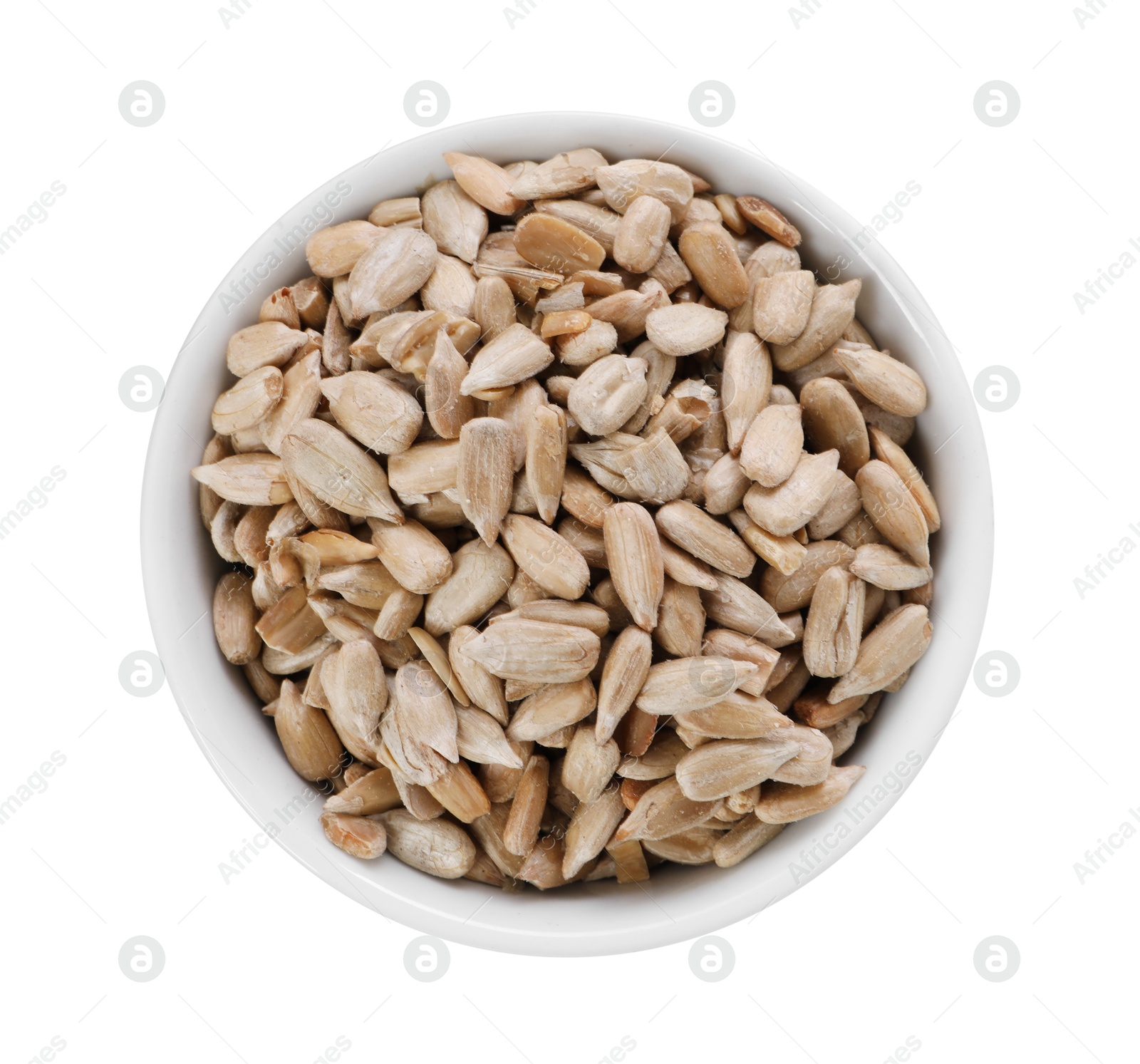 Photo of Peeled sunflower seeds in bowl isolated on white, top view