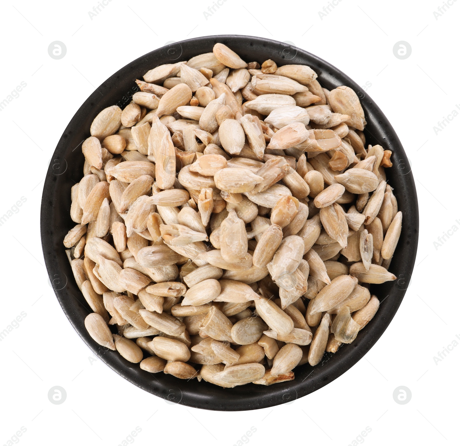 Photo of Peeled sunflower seeds in bowl isolated on white, top view