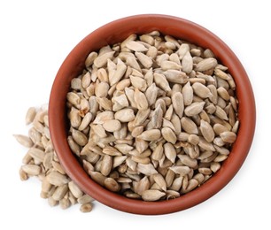 Photo of Peeled sunflower seeds in bowl isolated on white, top view