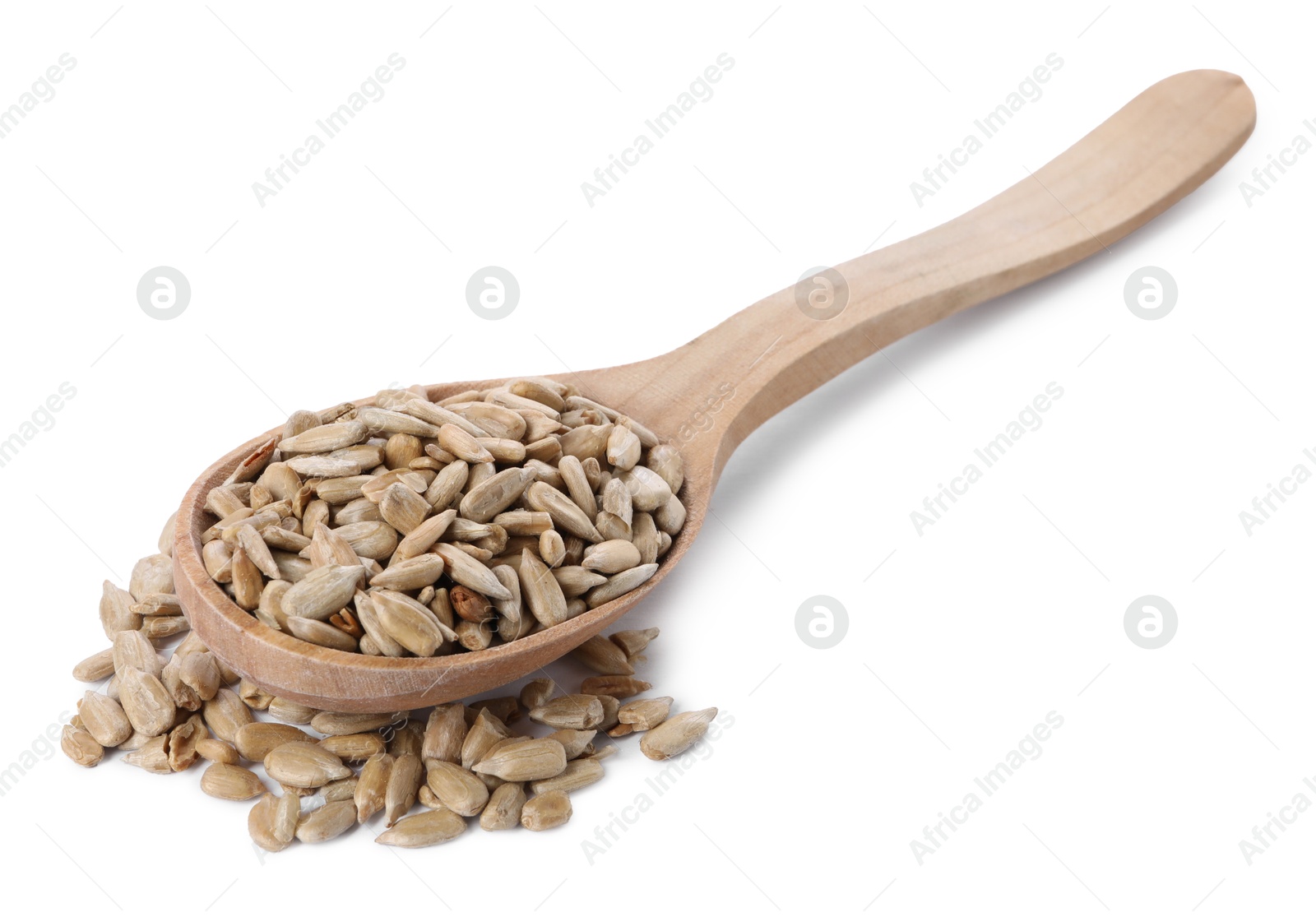 Photo of Peeled sunflower seeds in wooden spoon isolated on white