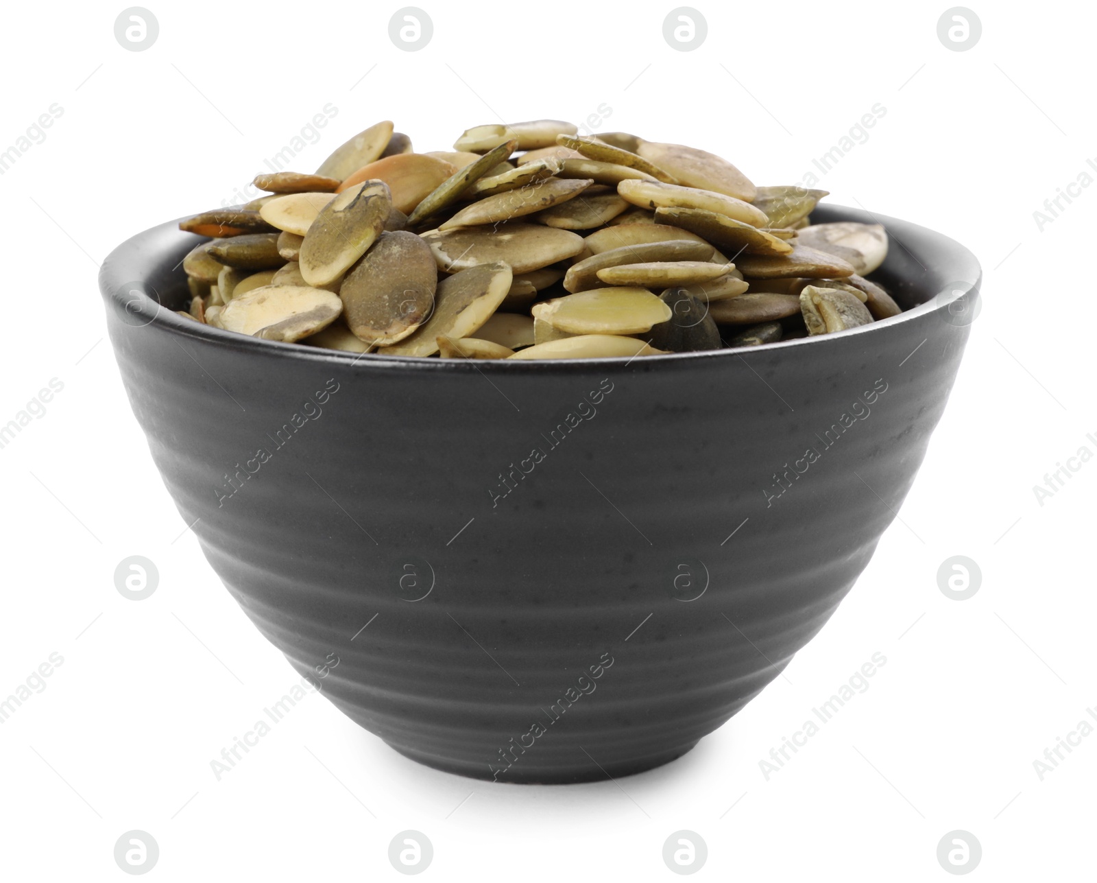 Photo of Peeled pumpkin seeds in bowl isolated on white