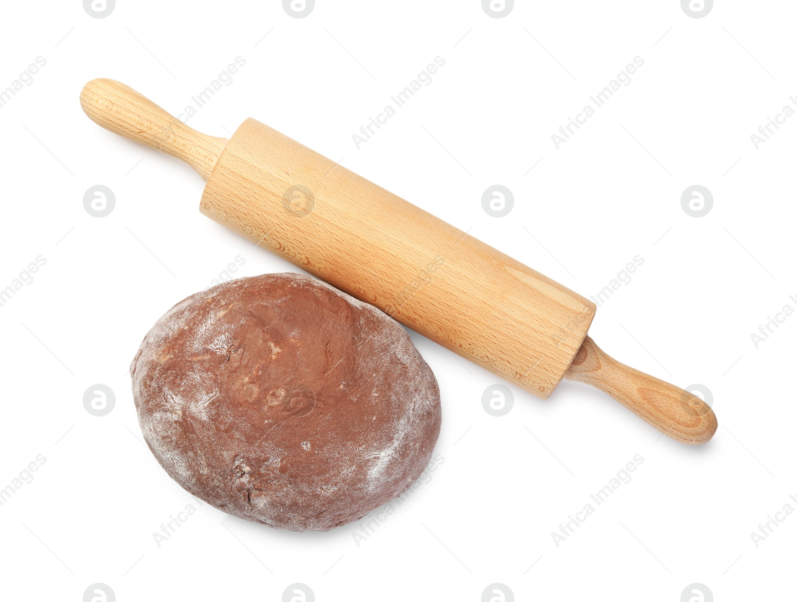 Photo of Chocolate dough and wooden rolling pin isolated on white, top view