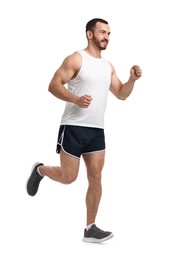 Photo of Handsome young man running on white background