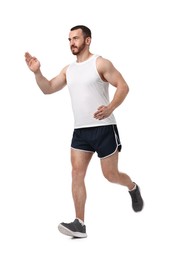 Photo of Handsome young man running on white background