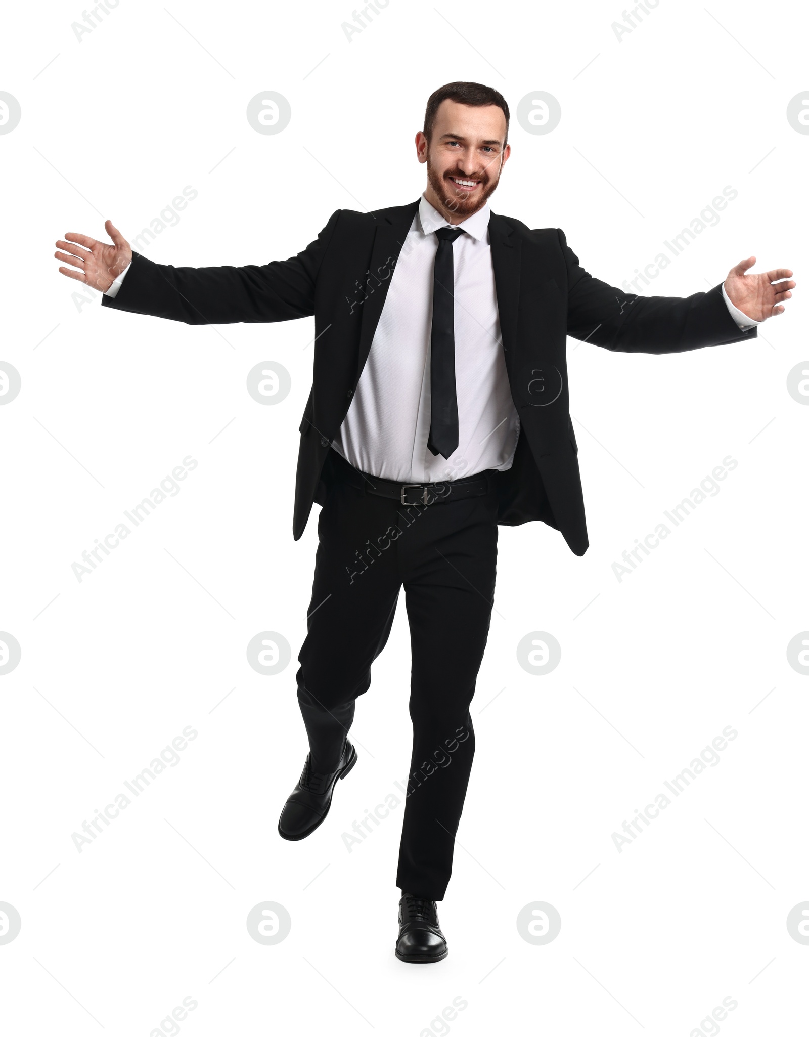 Photo of Young businessman in suit running on white background