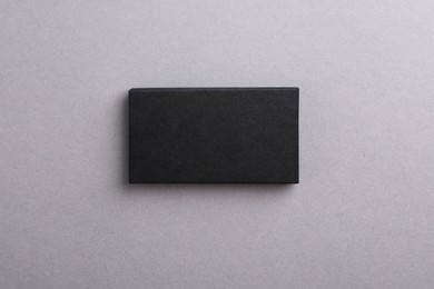 Photo of Blank business cards on grey background, top view. Mockup for design