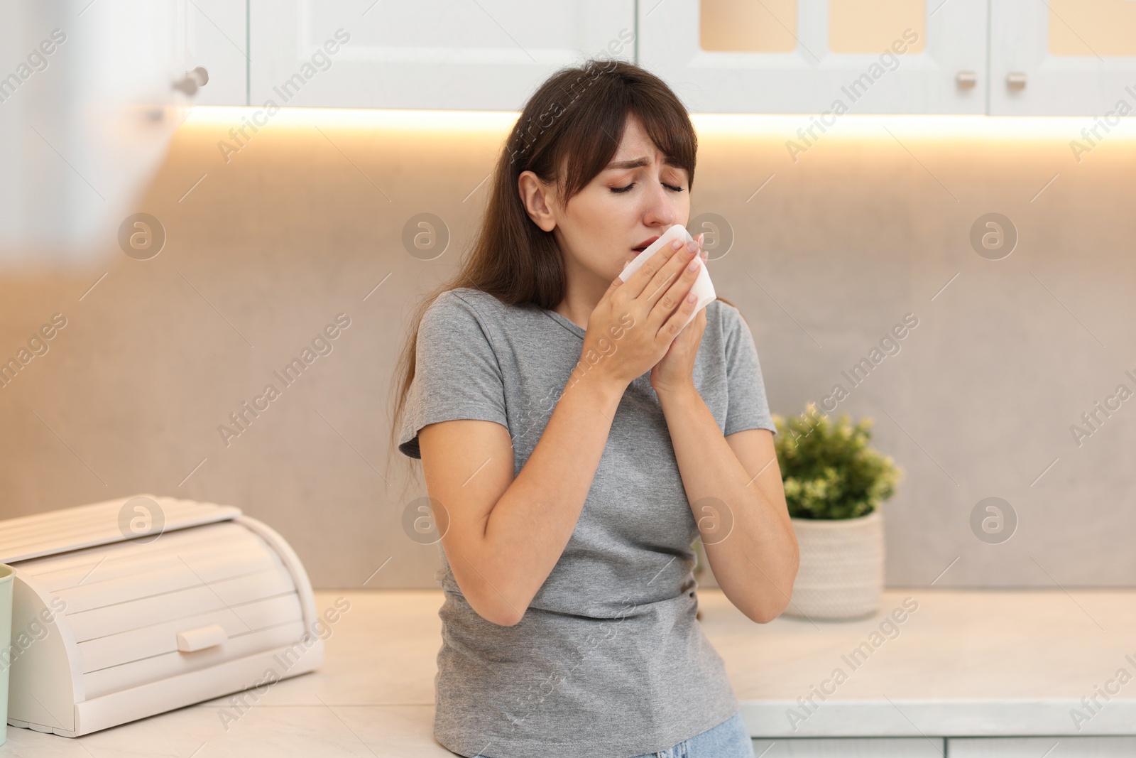 Photo of Tired woman suffering from sinusitis at home