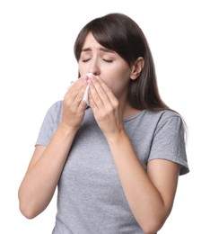 Photo of Woman with napkin suffering from sinusitis on white background