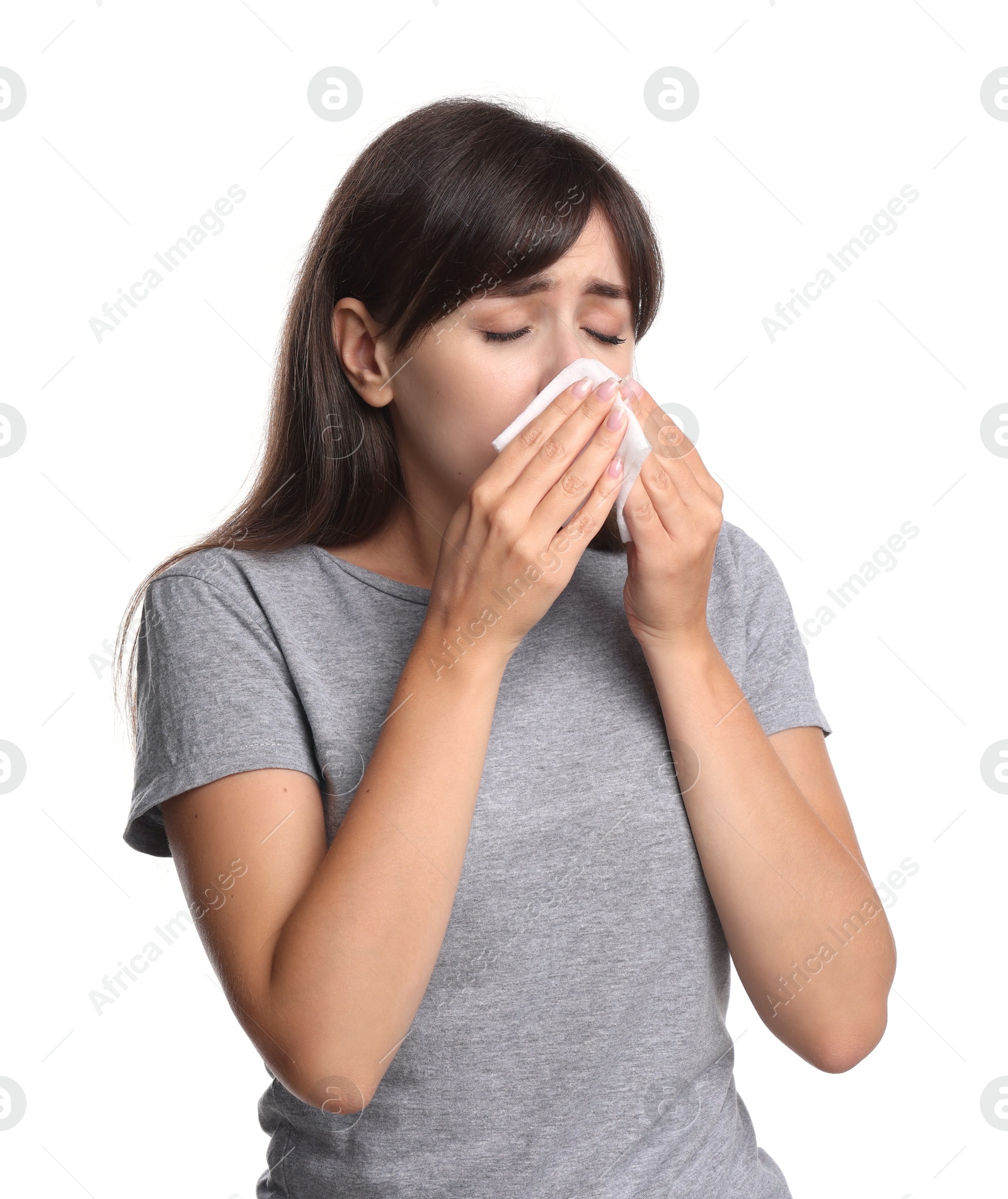 Photo of Woman with napkin suffering from sinusitis on white background