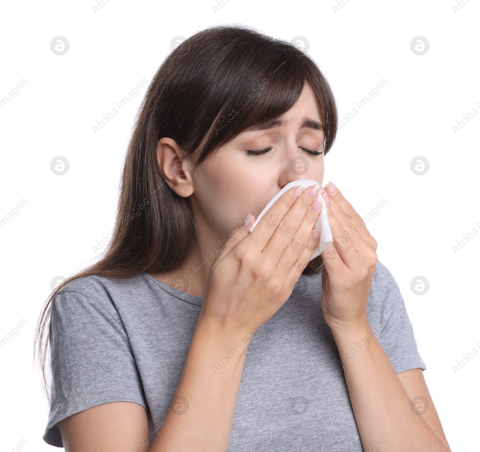 Photo of Woman with napkin suffering from sinusitis on white background