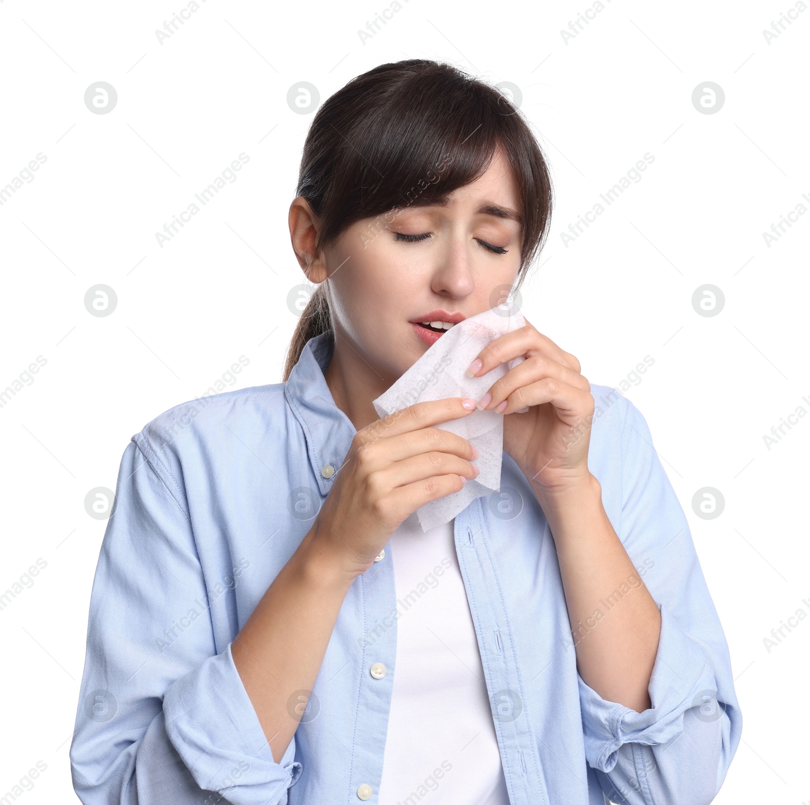 Photo of Woman with napkin suffering from sinusitis on white background