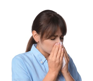 Woman with napkin suffering from sinusitis on white background