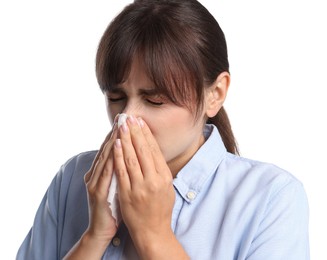 Photo of Woman with napkin suffering from sinusitis on white background