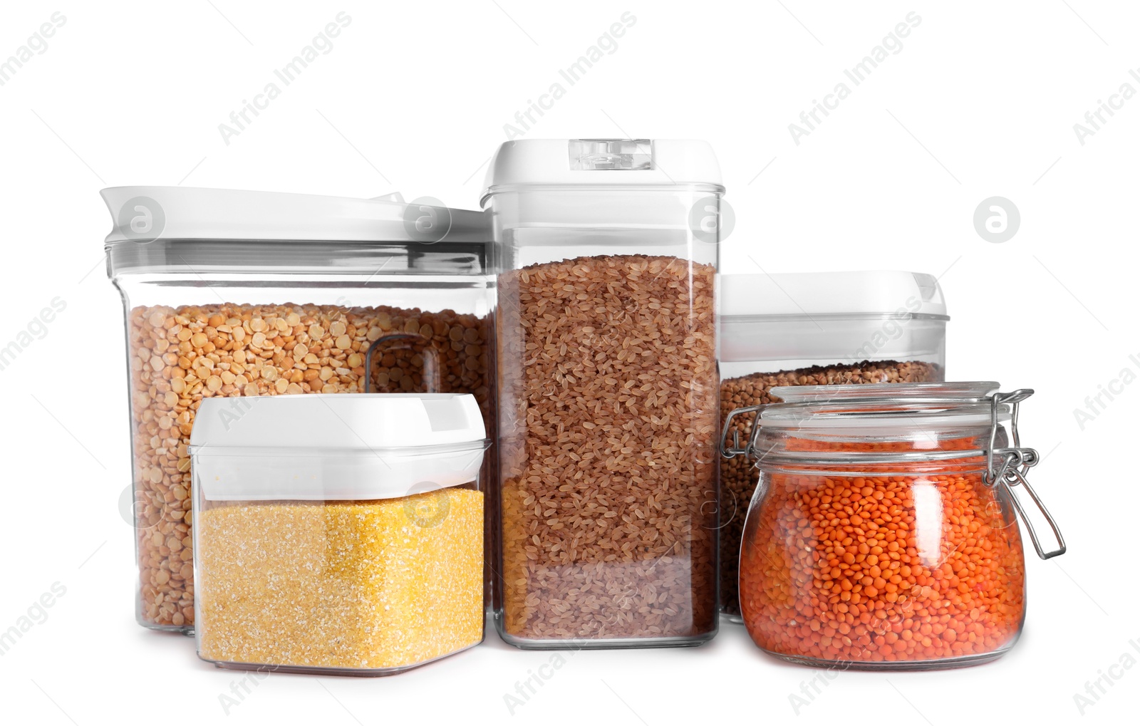 Photo of Different types of cereals and legumes in containers isolated on white