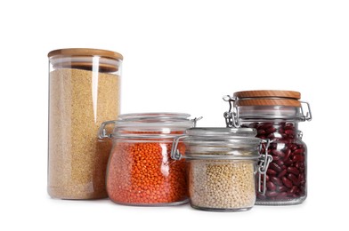 Photo of Different types of cereals and legumes in containers isolated on white