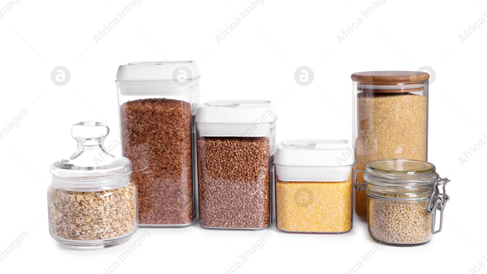 Photo of Different types of cereals in containers isolated on white