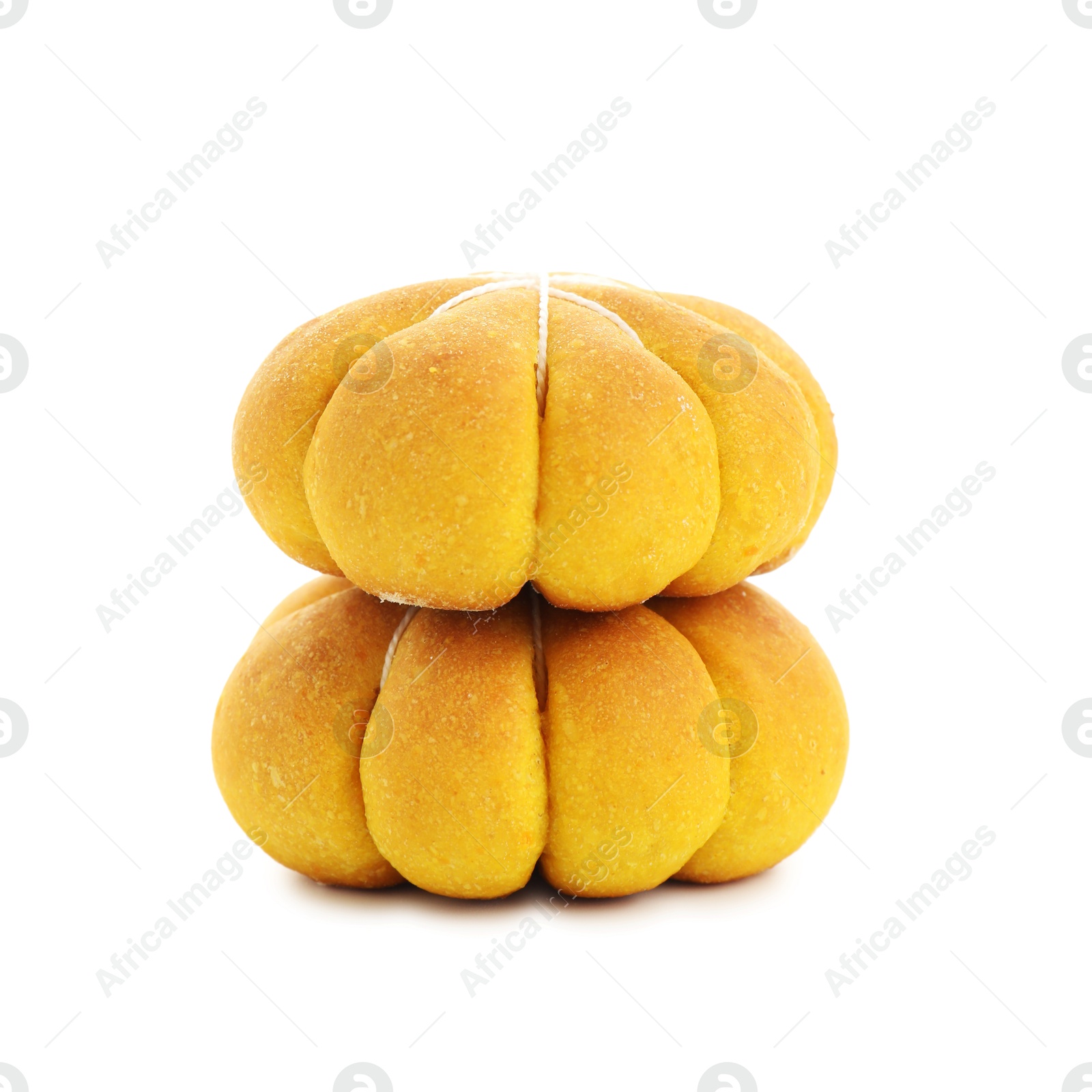 Photo of Stack of tasty pumpkin shaped buns isolated on white