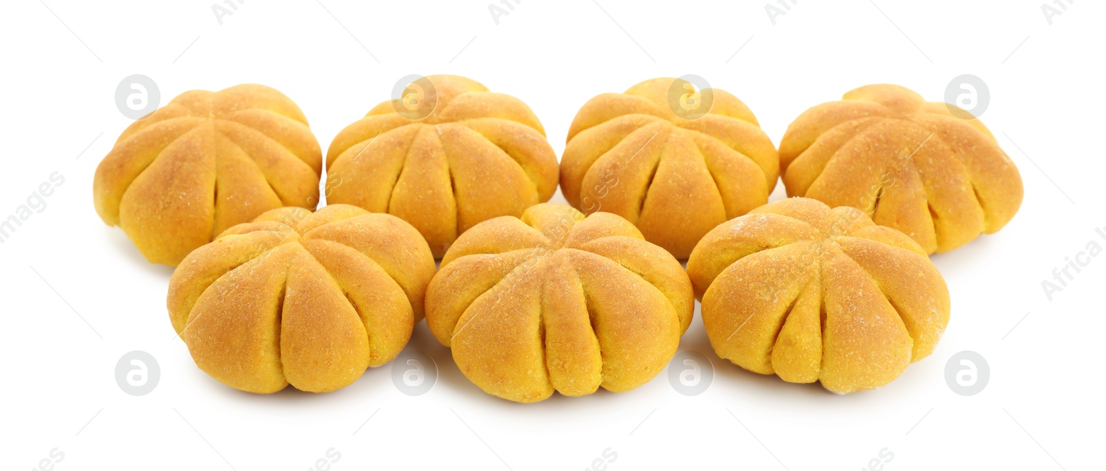 Photo of Tasty pumpkin shaped buns isolated on white