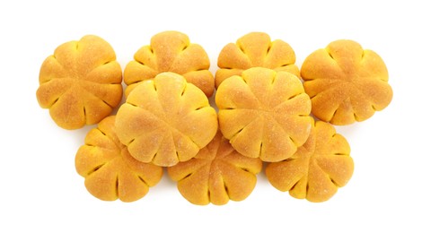 Photo of Tasty pumpkin shaped buns isolated on white, top view