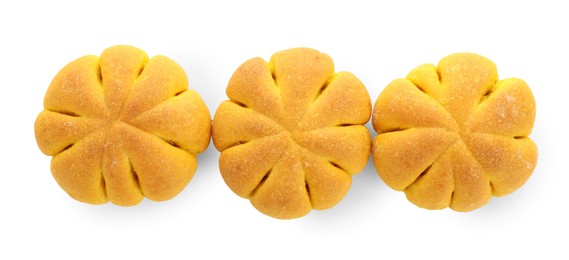 Photo of Tasty pumpkin shaped buns isolated on white, top view