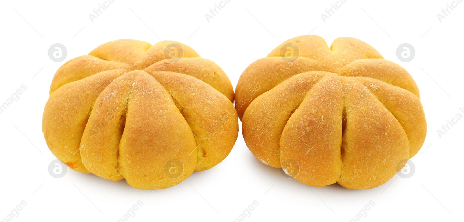 Photo of Tasty pumpkin shaped buns isolated on white