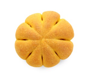 Photo of One tasty pumpkin shaped bun isolated on white, top view