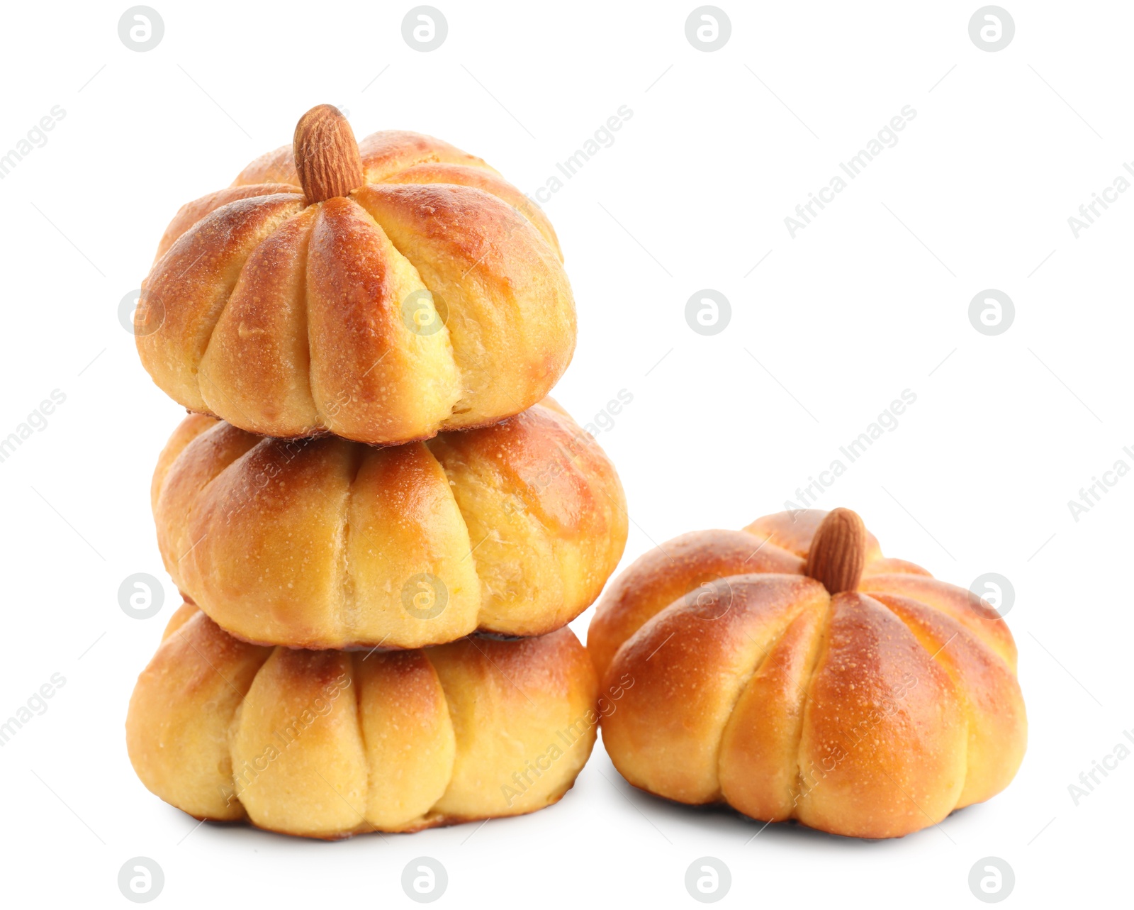 Photo of Tasty pumpkin shaped buns isolated on white