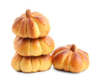 Photo of Tasty pumpkin shaped buns isolated on white