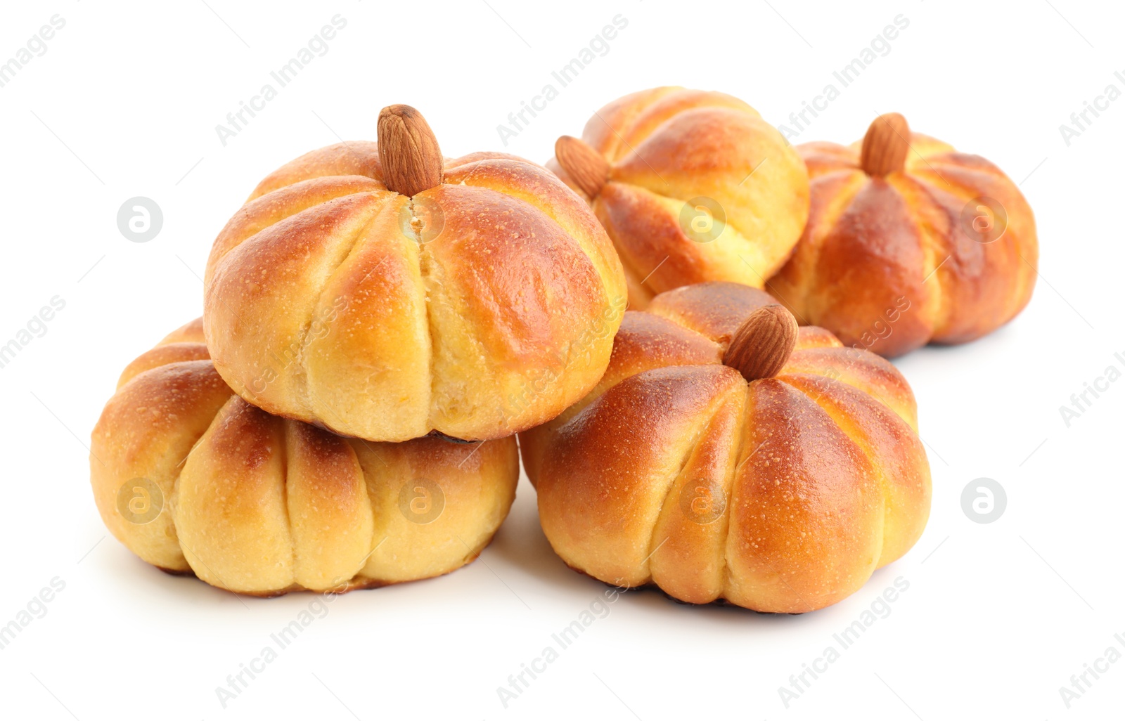 Photo of Tasty pumpkin shaped buns isolated on white