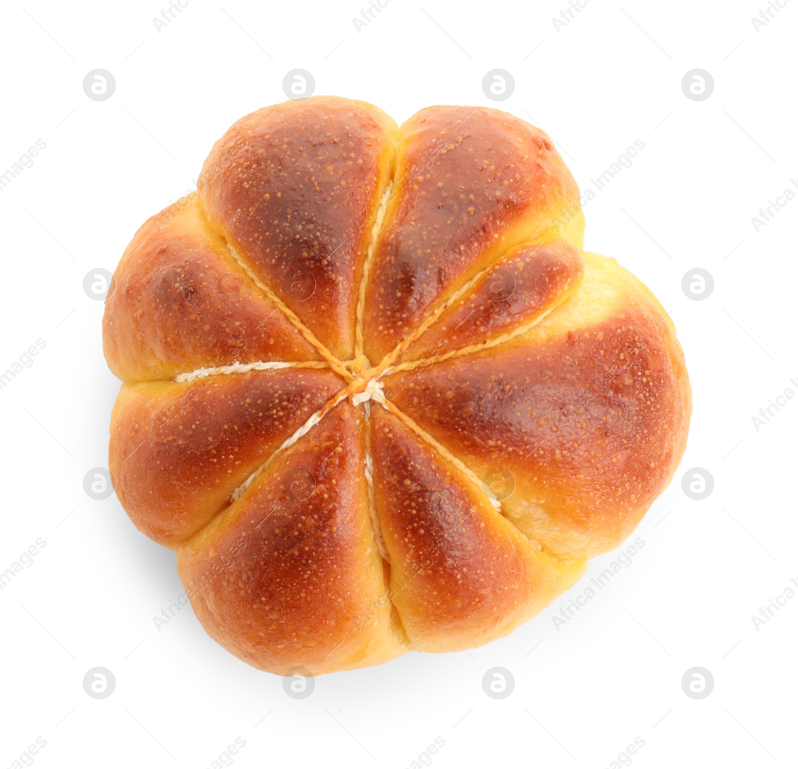 Photo of One tasty pumpkin shaped bun isolated on white, top view