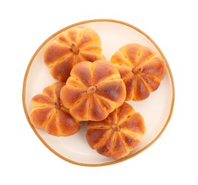 Photo of Tasty pumpkin shaped buns isolated on white, top view