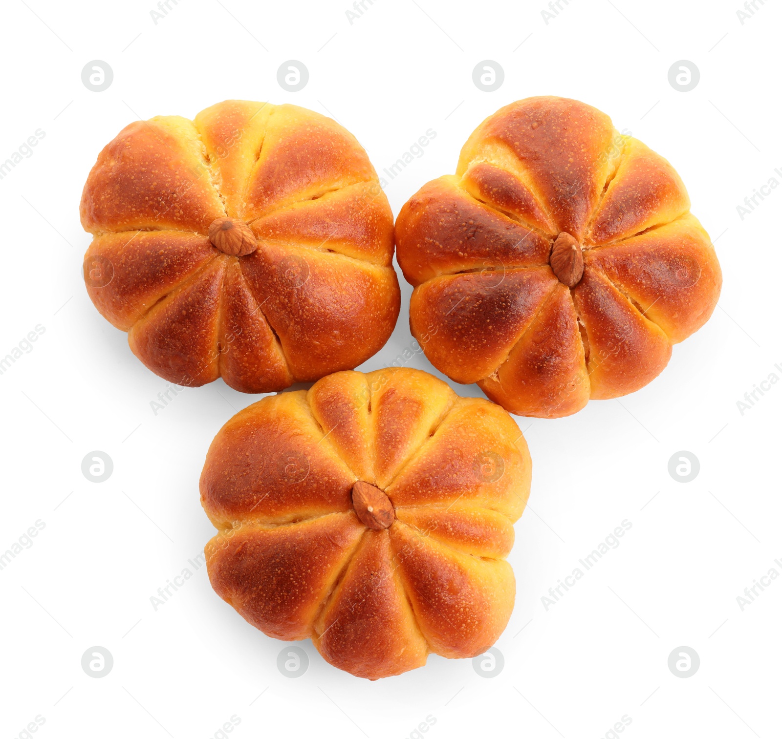 Photo of Tasty pumpkin shaped buns isolated on white, top view