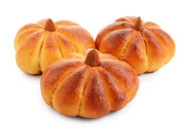 Photo of Tasty pumpkin shaped buns isolated on white