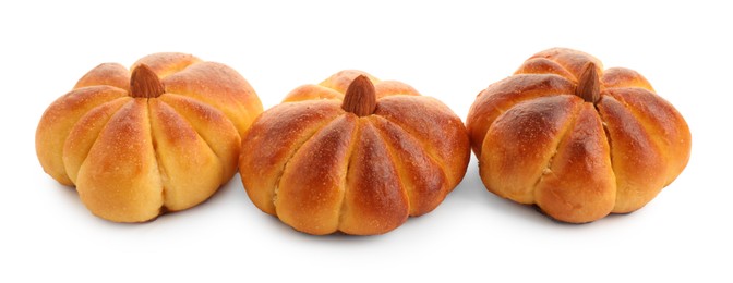 Photo of Tasty pumpkin shaped buns isolated on white