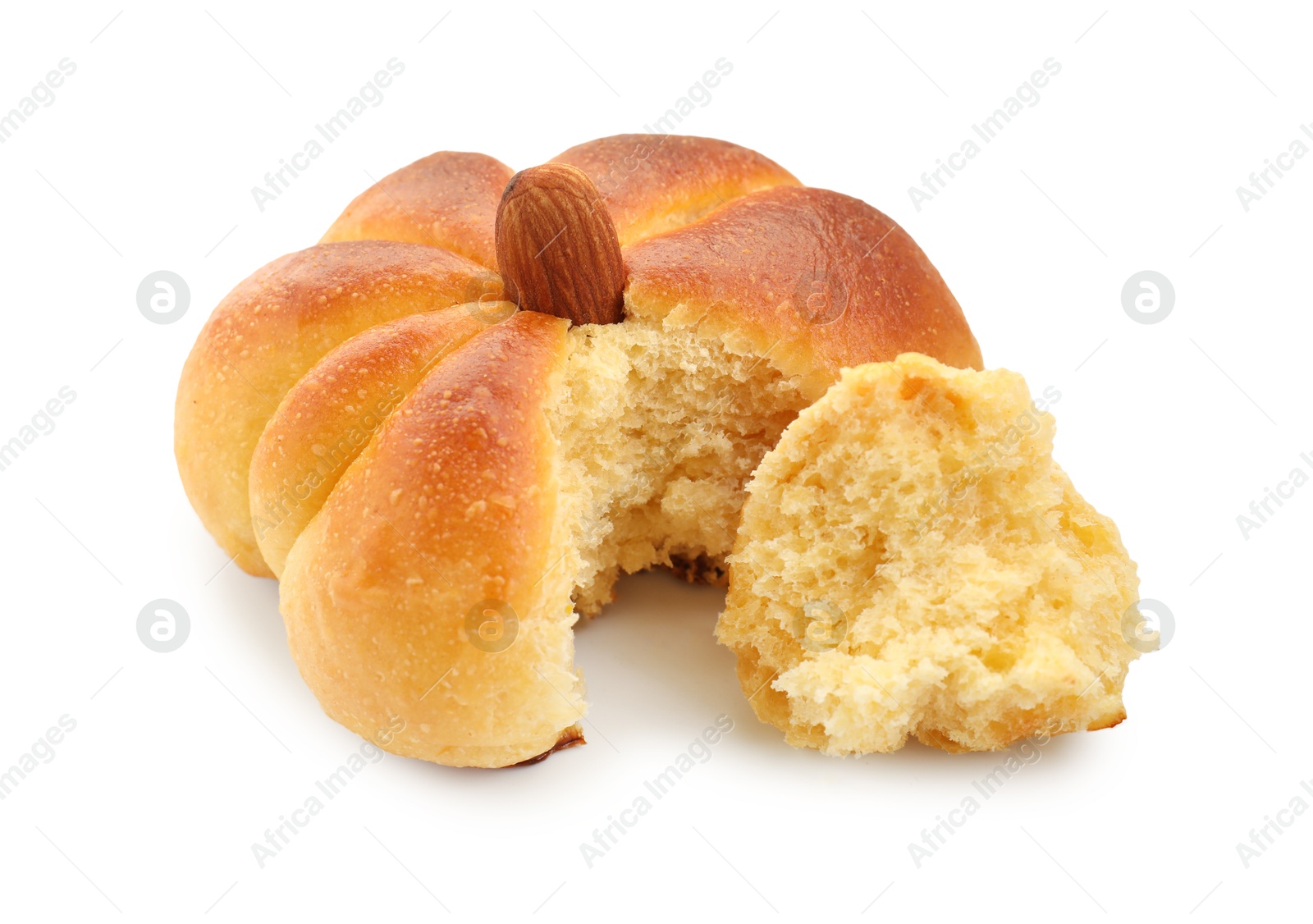 Photo of One tasty pumpkin shaped bun isolated on white