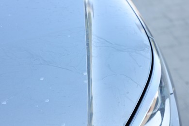 Modern auto with dirty stains, closeup view