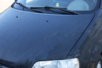 Modern auto with dirty stains, closeup view