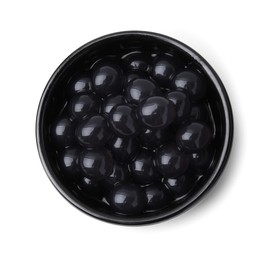 Photo of Dark tapioca pearls in bowl isolated on white, top view