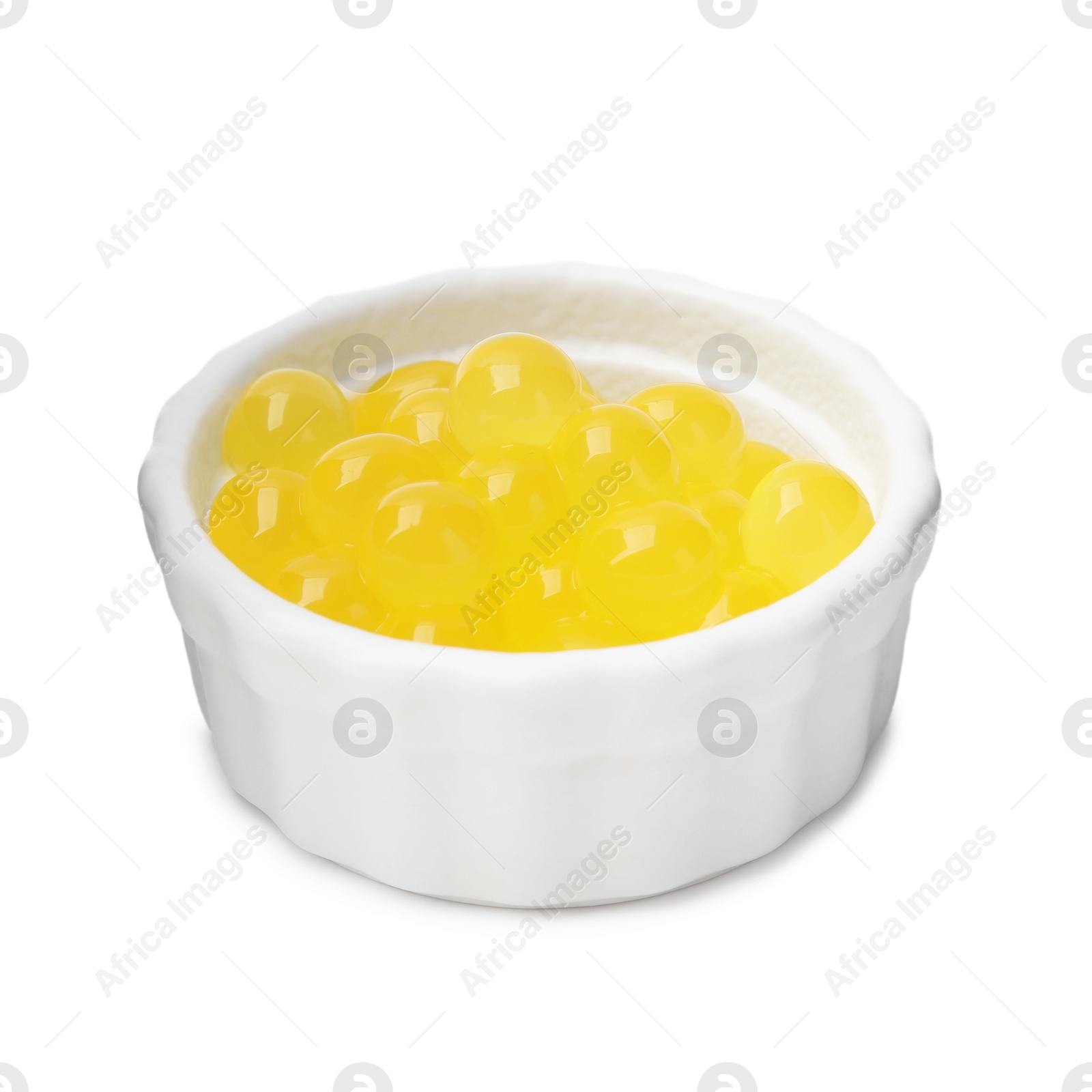 Photo of Bright tapioca pearls in bowl isolated on white