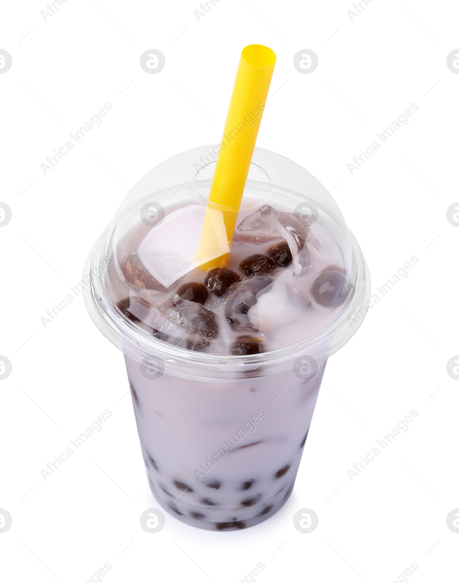 Photo of Tasty milk bubble tea in plastic cup isolated on white