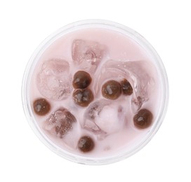 Photo of Tasty milk bubble tea in plastic cup isolated on white, top view