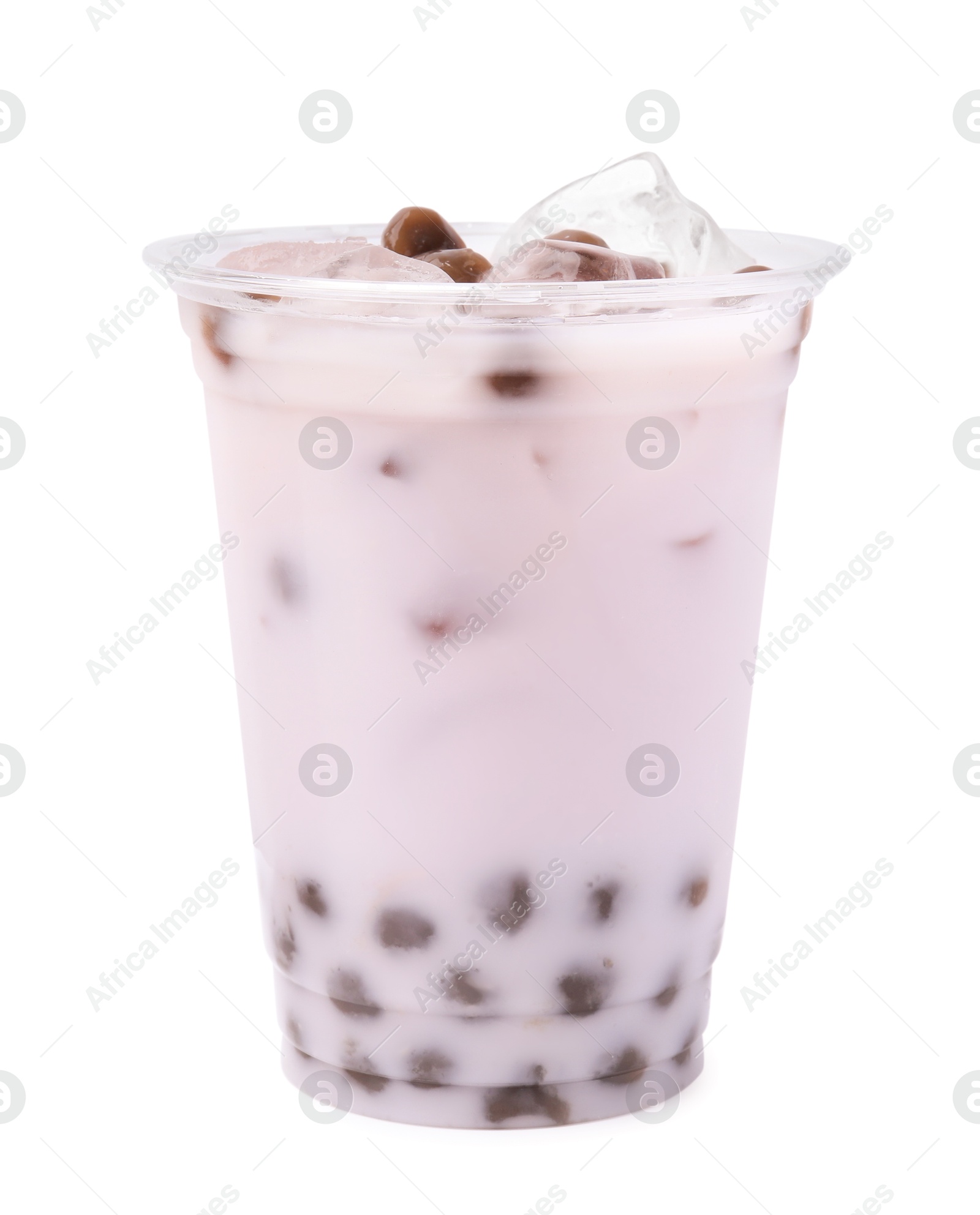 Photo of Tasty milk bubble tea in plastic cup isolated on white