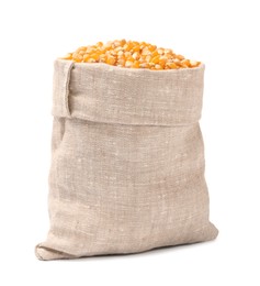 Fresh corn kernels in burlap sack isolated on white